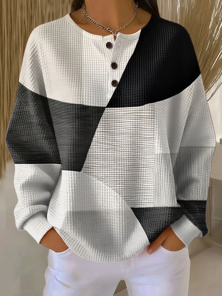 Pull Créatine — encolure Henley, imprimé géométrique